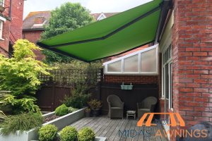 fabric-awnings-polycarbonate-roof-vs-fabric-awning-which-is-better-for-your-singaporean-home-midas-awnings-singapore