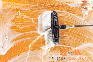 scrubbing-awning-roof-step-by-step-diy-awning-roof-cleaning-for-homeowners-awning-roof-midas-awning-singapore