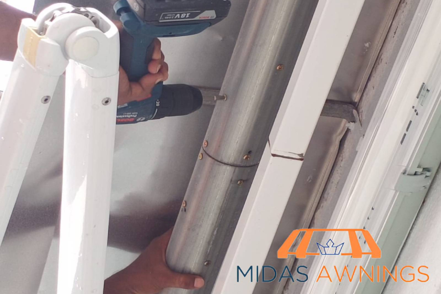 contractor-drilling-retractable-awning-replacement-services-midas-awning-singapore