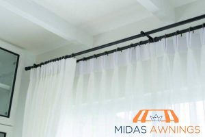 consider-wall-and-ceiling-how-high-should-you-hang-your-curtain-rod-in-singapore-installation-tips-for-perfect-placement-curtain-rod-installation-midas-awnings-singapore