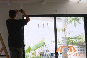 consider-wall-space-around-the-window-how-to-choose-the-right-curtain-rod-length-for-any-window-in-your-home-curtain-rod-installation-midas-awnings-singapore