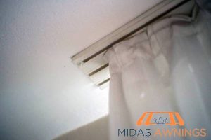 curtain-tracks-vs-curtain-rods-which-one-is-better-for-singapore-homes-curtain-track-installation-midas-awnings-singapore