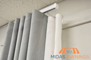 durability-curtain-track-vs-curtain-rods-which-one-is-better-for-singapore-homes-curtain-track-installation-midas-awnings-singapore
