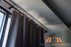 ensure-full-window-coverage-how-high-should-you-hang-your-curtain-rod-in-singapore-installation-tips-for-perfect-placement-curtain-rod-installation-midas-awnings-singapore