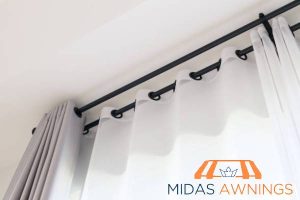 follow-the-standard-height-how-high-should-you-hang-your-curtain-rod-in-singapore-installation-tips-for-perfect-placement-curtain-rod-installation-midas-awnings-singapore