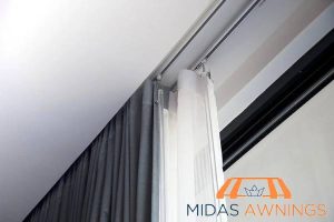 functionality-curtain-track-vs-curtain-rods-which-one-is-better-for-singapore-homes-curtain-track-installation-midas-awnings-singapore